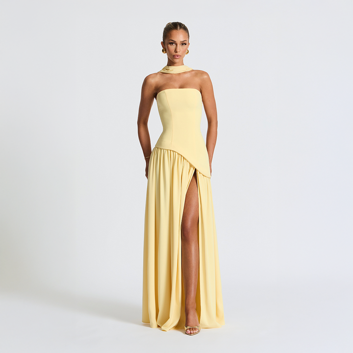 Strapless long dress with asymmetric cut and high slit