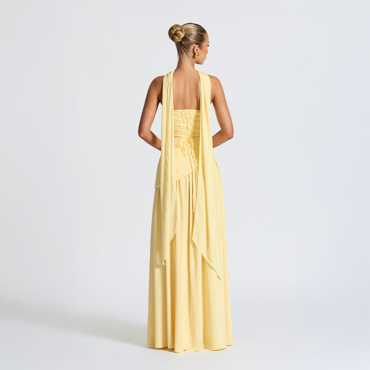 Strapless long dress with asymmetric cut and high slit