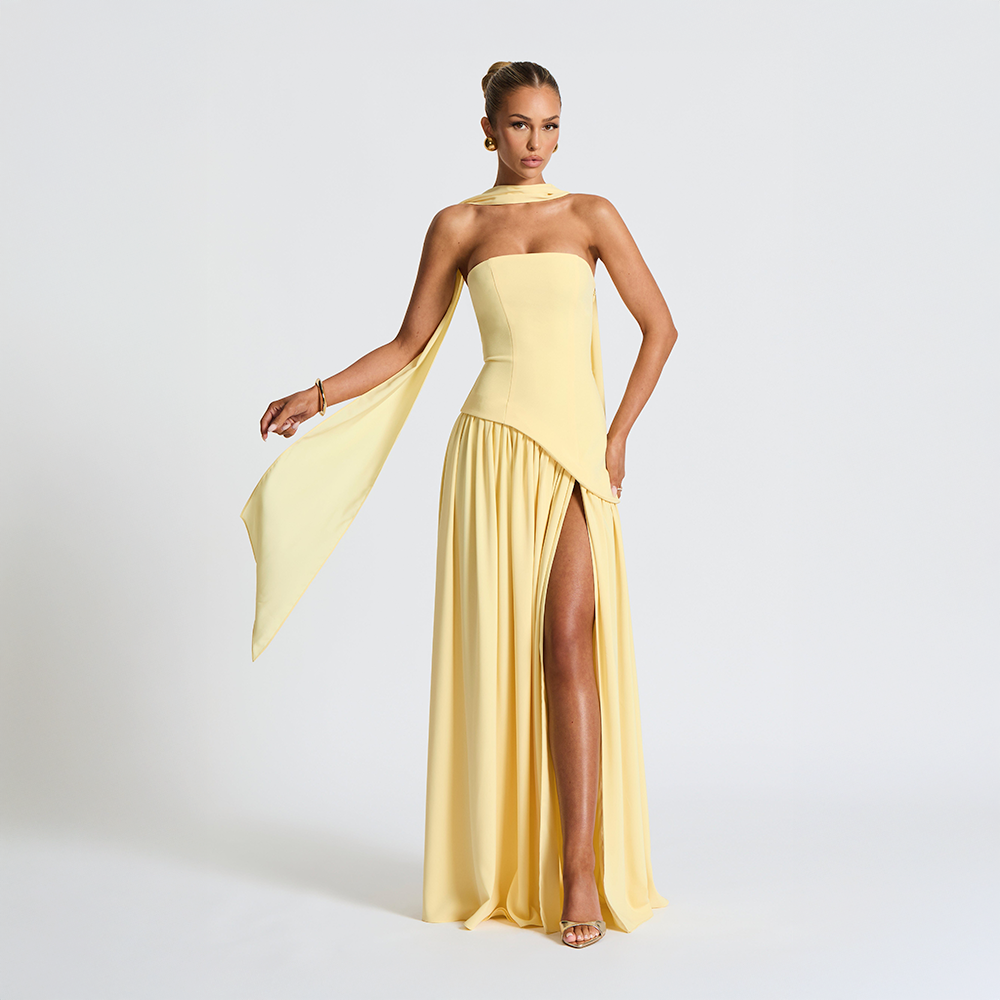 Strapless long dress with asymmetric cut and high slit