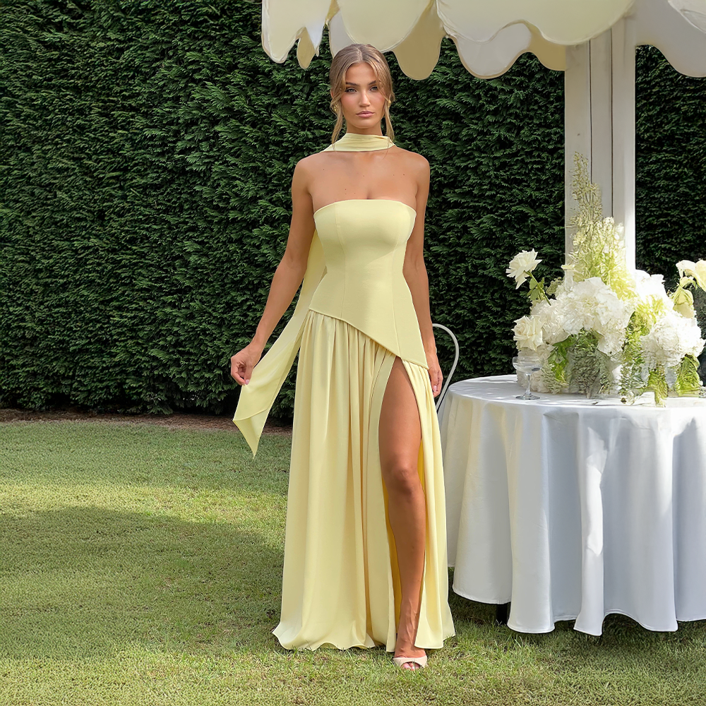 Strapless long dress with asymmetric cut and high slit