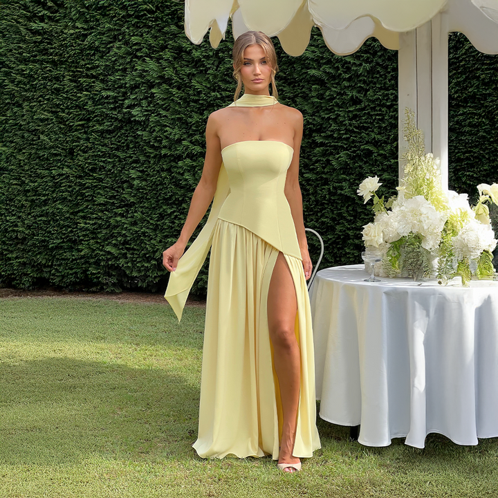 Strapless long dress with asymmetric cut and high slit
