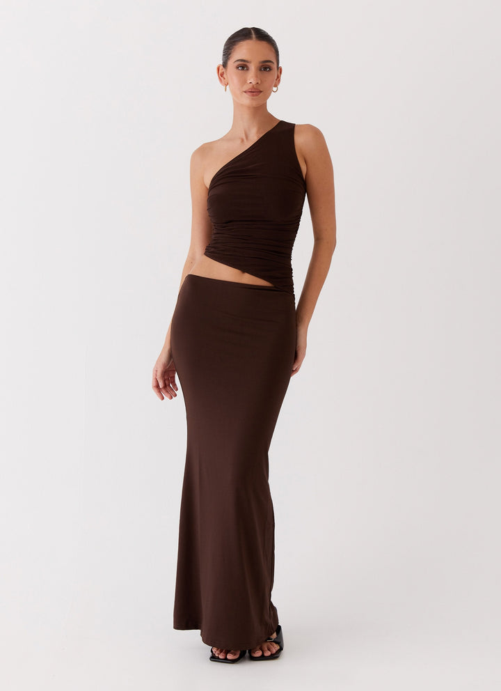 Long dress with one shoulder design and cut-out detail
