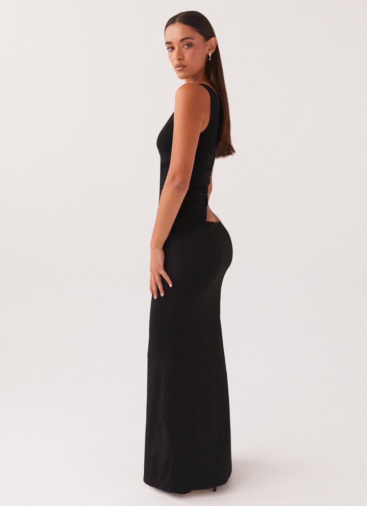 Long dress with one shoulder design and cut-out detail