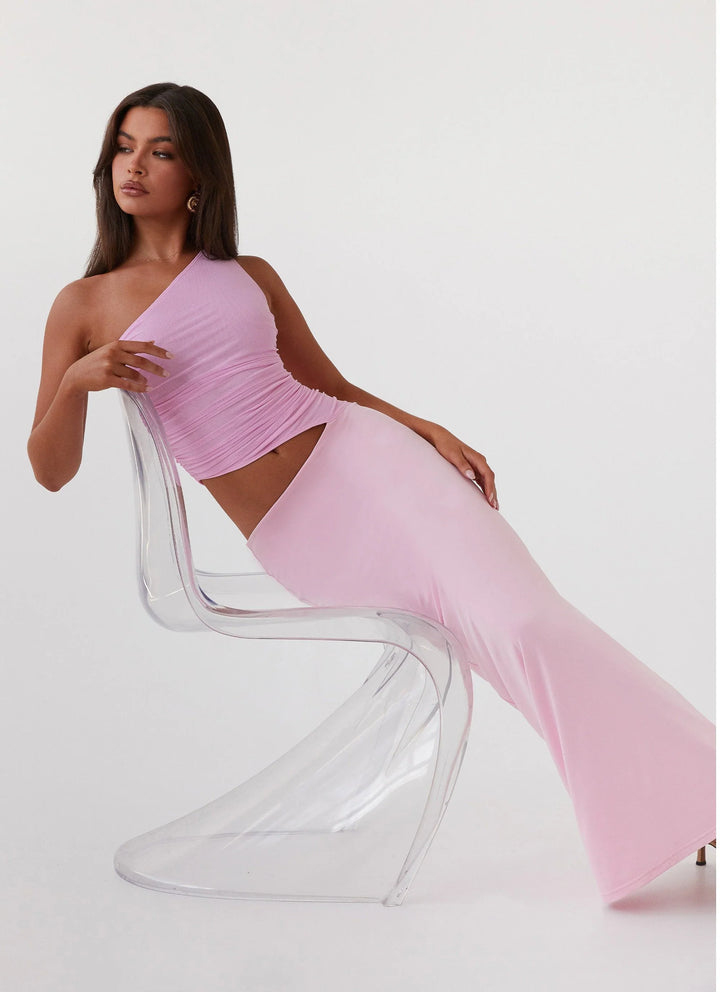 Long dress with one shoulder design and cut-out detail