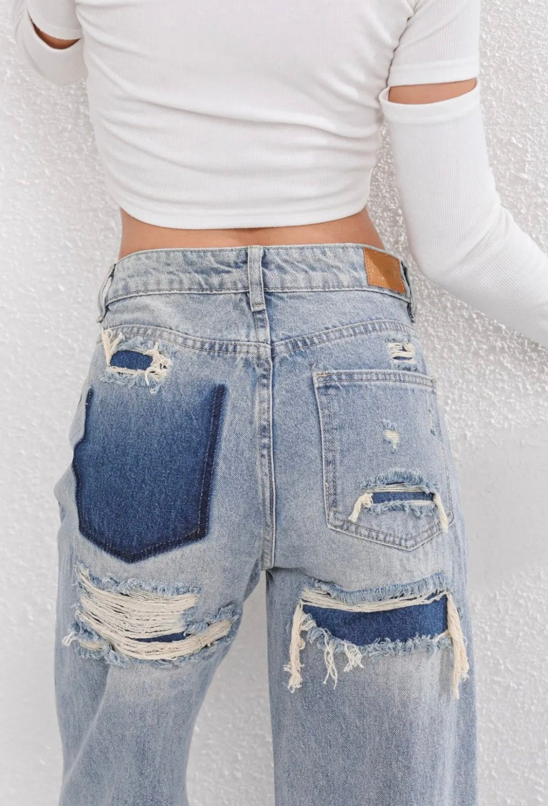 Vintage Ripped Jeans with Unique Patchwork Detail