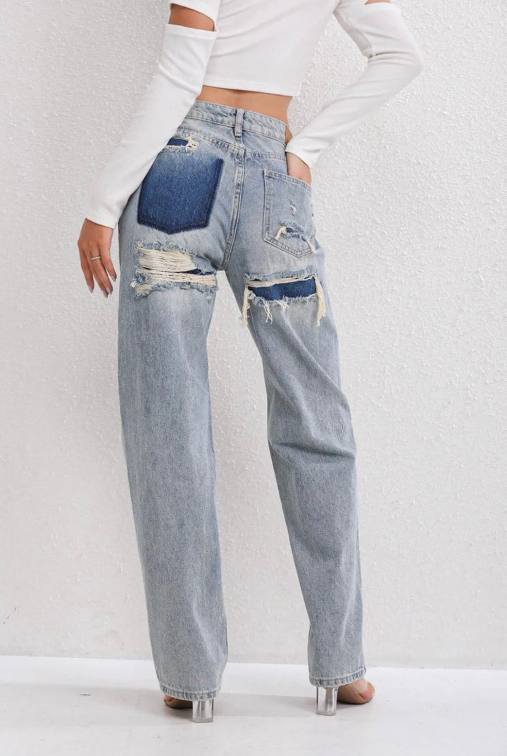 Vintage Ripped Jeans with Unique Patchwork Detail