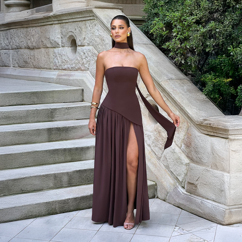 Strapless long dress with asymmetric cut and high slit