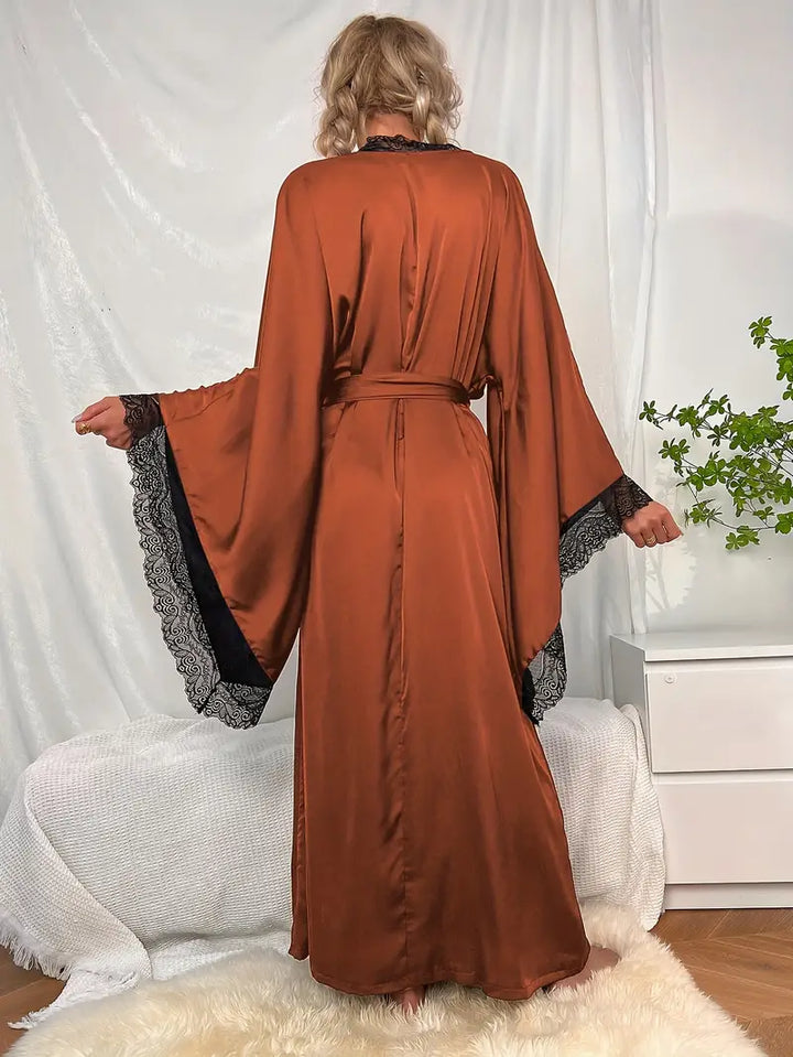 Long Women's Lace Dress with Waist Belt and Wide Sleeves