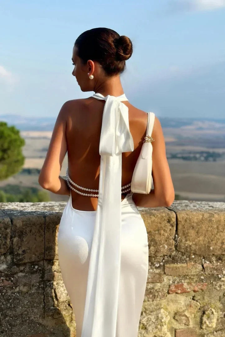 Long white dress for women with open back and bow