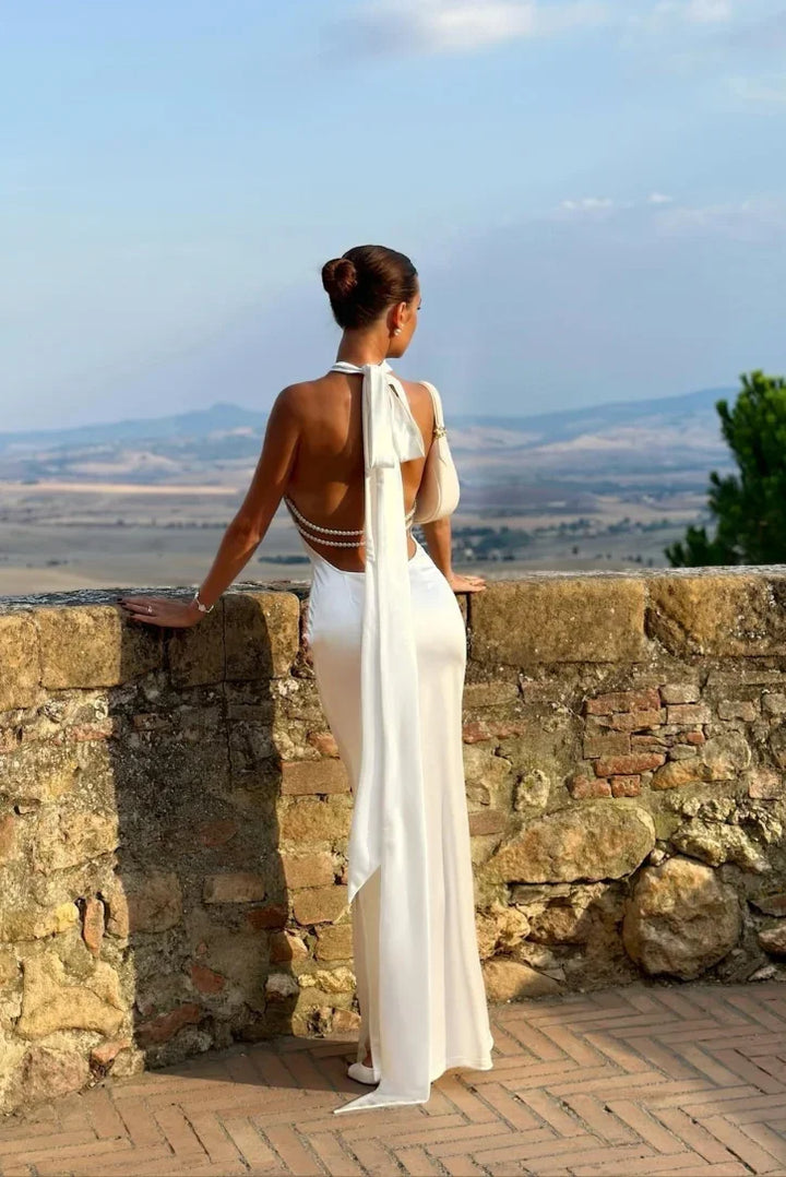 Long white dress for women with open back and bow