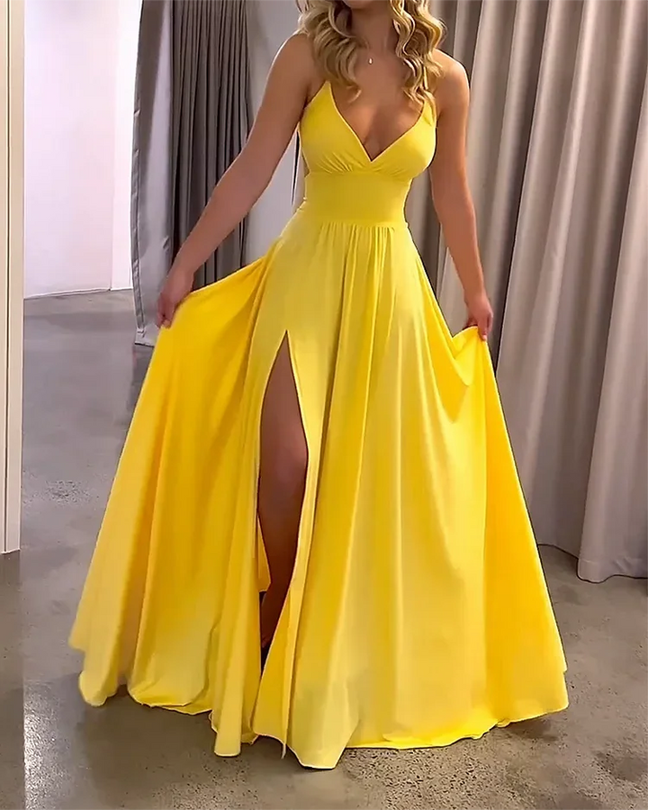 Long flowing split dress with plunging neckline