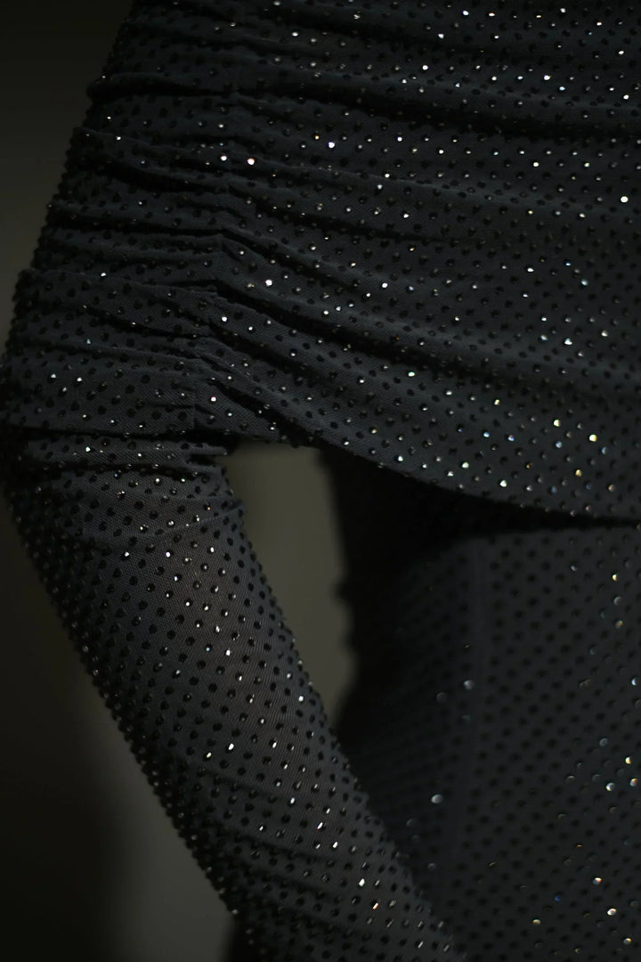 Long Shimmering Dress with Long Sleeves and Off-Shoulder Design