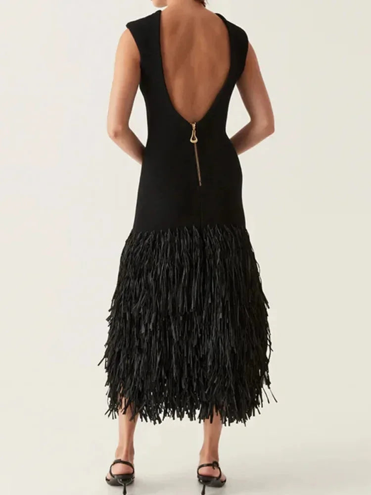 Black sleeveless midi dress with fringe hem