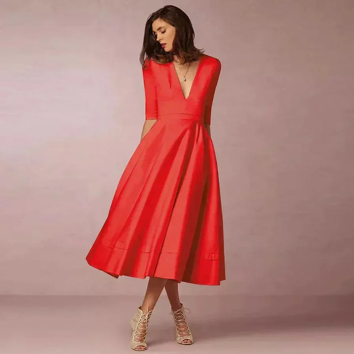 Flared Midi Dress with V-Neck and 3/4 Sleeves with Pockets