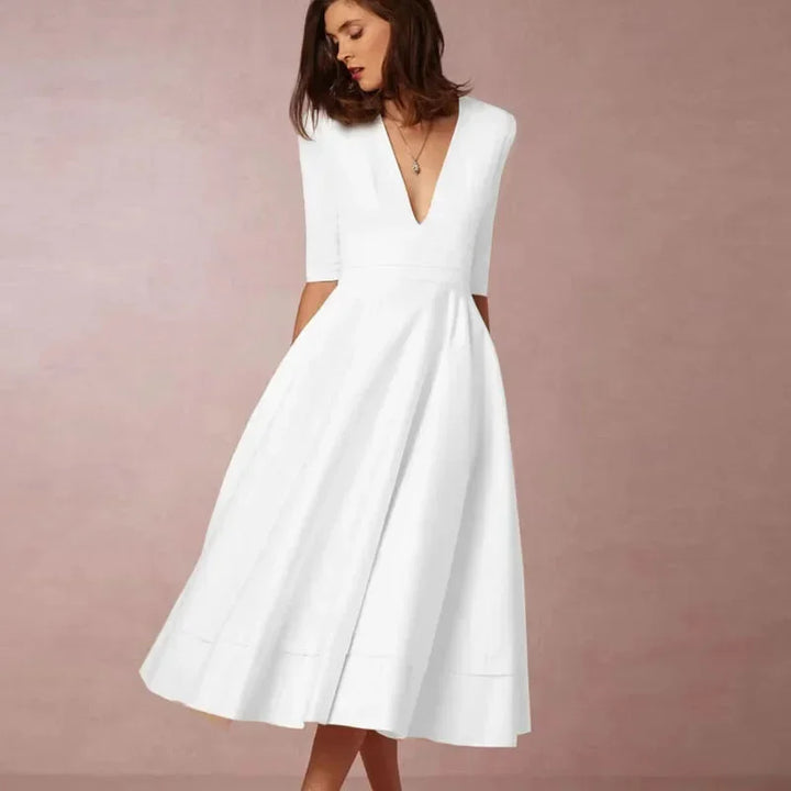 Flared Midi Dress with V-Neck and 3/4 Sleeves with Pockets