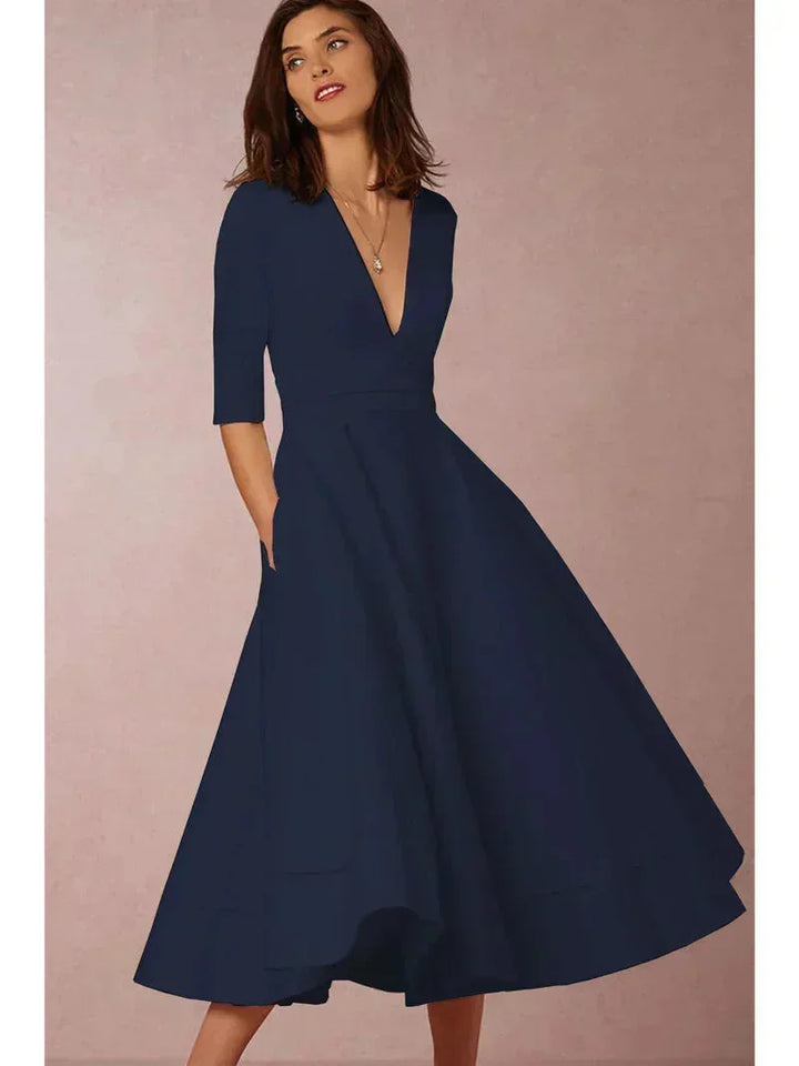 Flared Midi Dress with V-Neck and 3/4 Sleeves with Pockets