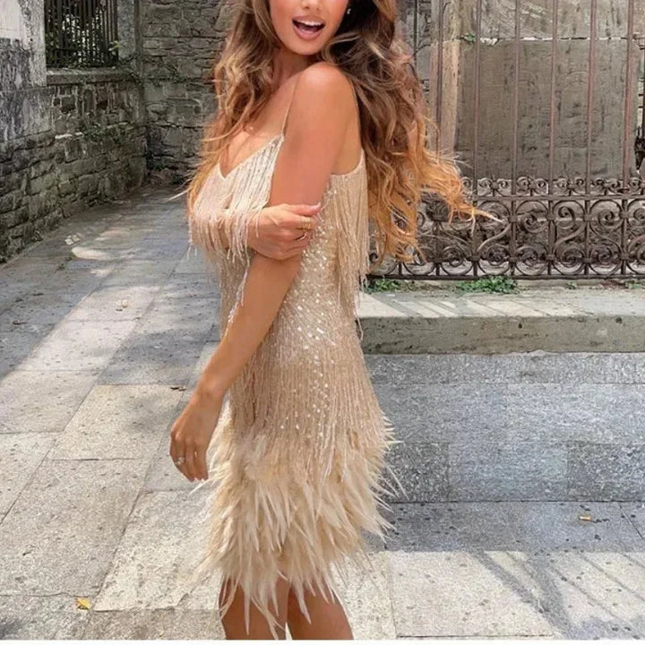 Short evening dress with sequins and feathers, thin straps