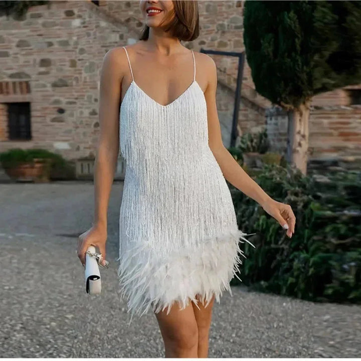 Short evening dress with sequins and feathers, thin straps