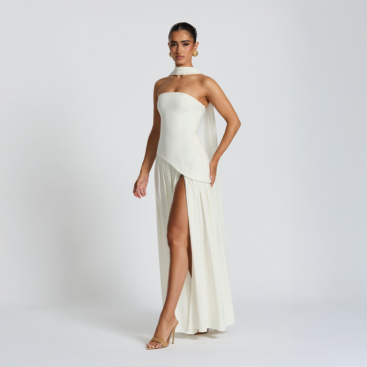 Strapless long dress with asymmetric cut and high slit